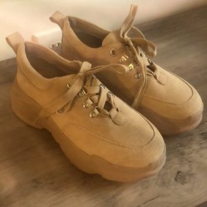 Nude colored Aldo sneakers